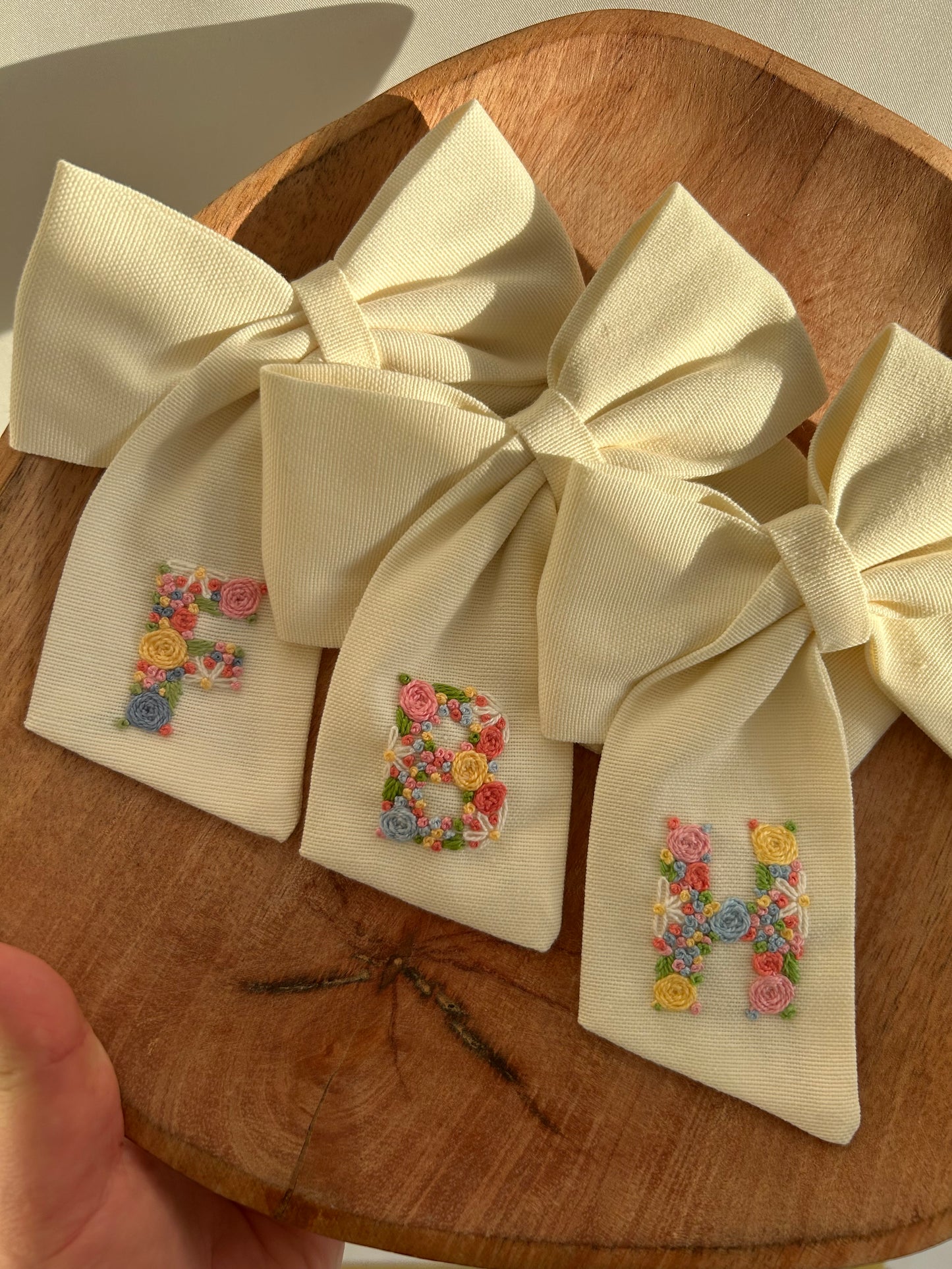 Hand embroidered custom initial Bow